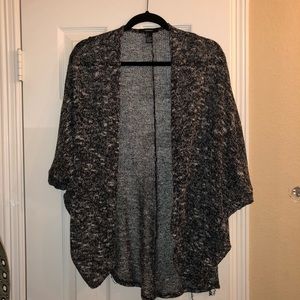 woman’s black and white Forever 21 cardigan